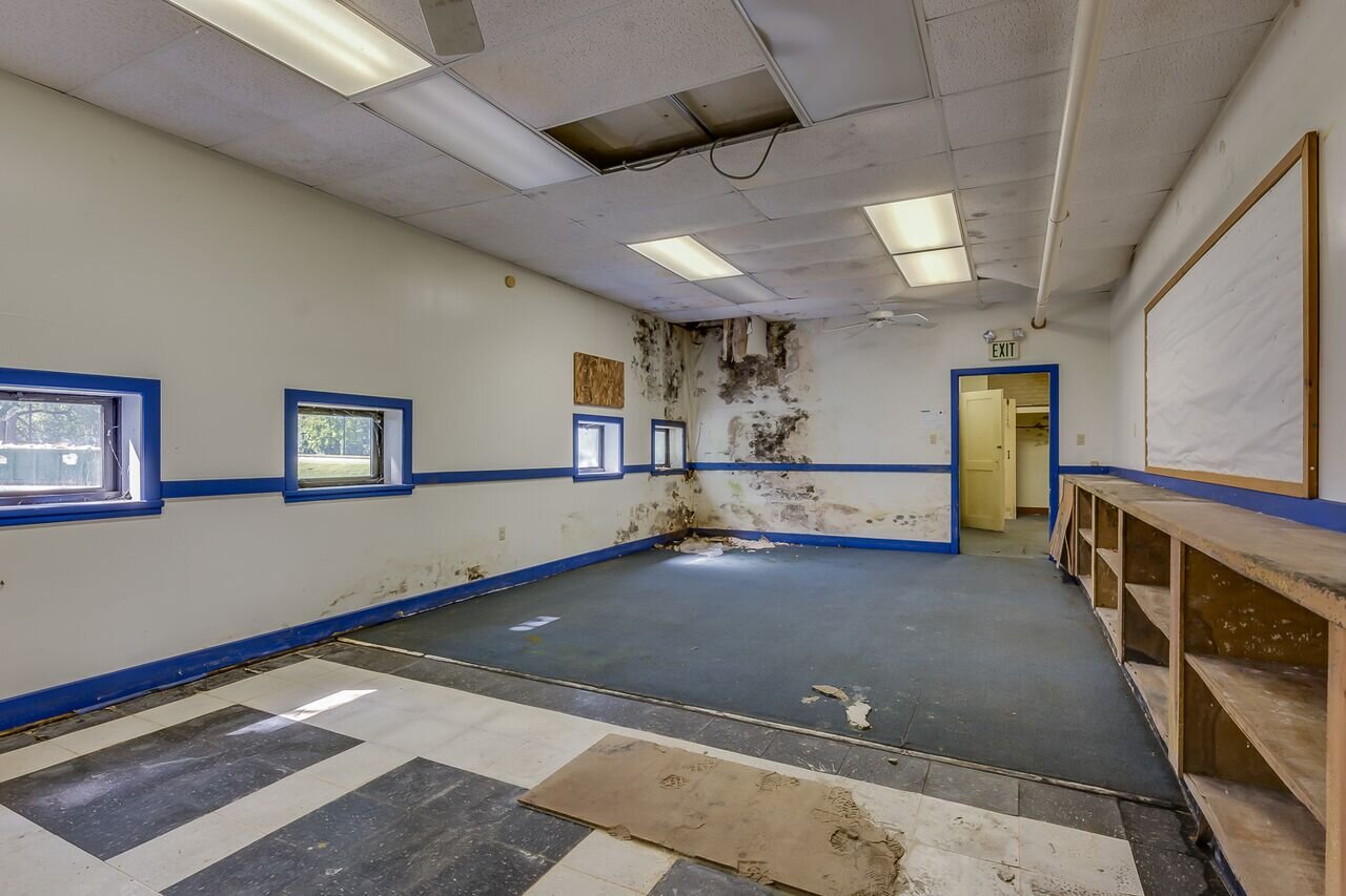 A room inside The Armory’s, now the bar, before restoration.