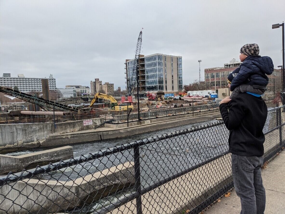 Me and my son – fourth and fifth generation sons of South Bend – watching the new power plant being constructed under what will become the new Seitz Park.&nbsp;